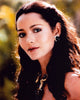 Barbara Carrera headshot photo print featuring a gold necklace.
