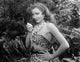 Claudette Colbert Jungle Photo Print showcasing classic cinema artwork.