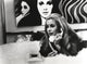 Black and white photo print of Catherine Deneuve with telephone.