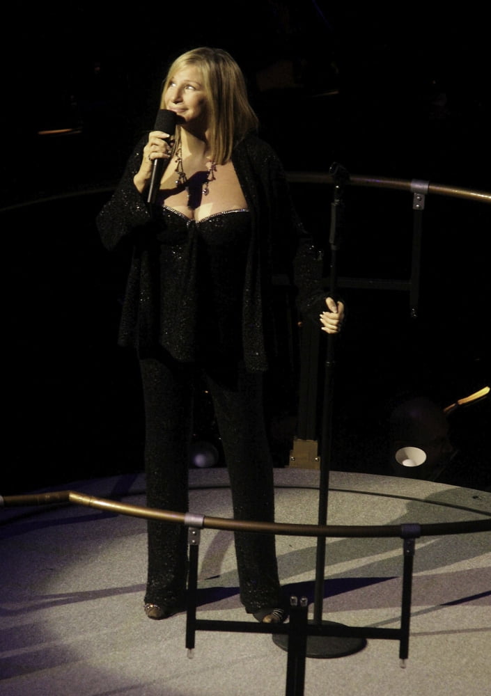 Barbra Streisand performing live photo print, available in multiple sizes.
