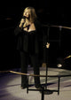 Barbra Streisand performing live photo print, available in multiple sizes.