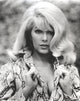 Stella Stevens black and white portrait wearing animal print coat photo print
