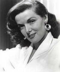 Jane Russell portrait photo print in white linen suit and gold hoop earrings.