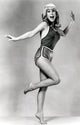 Barbara Eden Foot Up Photo Print, available in multiple sizes.