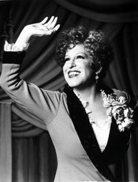 Bette Midler waving portrait in grey linen dress photo print