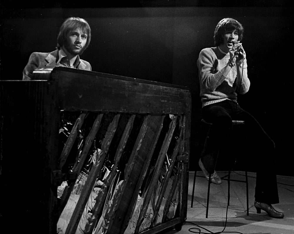 Maurice and Andy Gibb performing live on stage - Bee Gees photo print