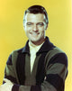 Robert Goulet photo print in yellow polo shirt