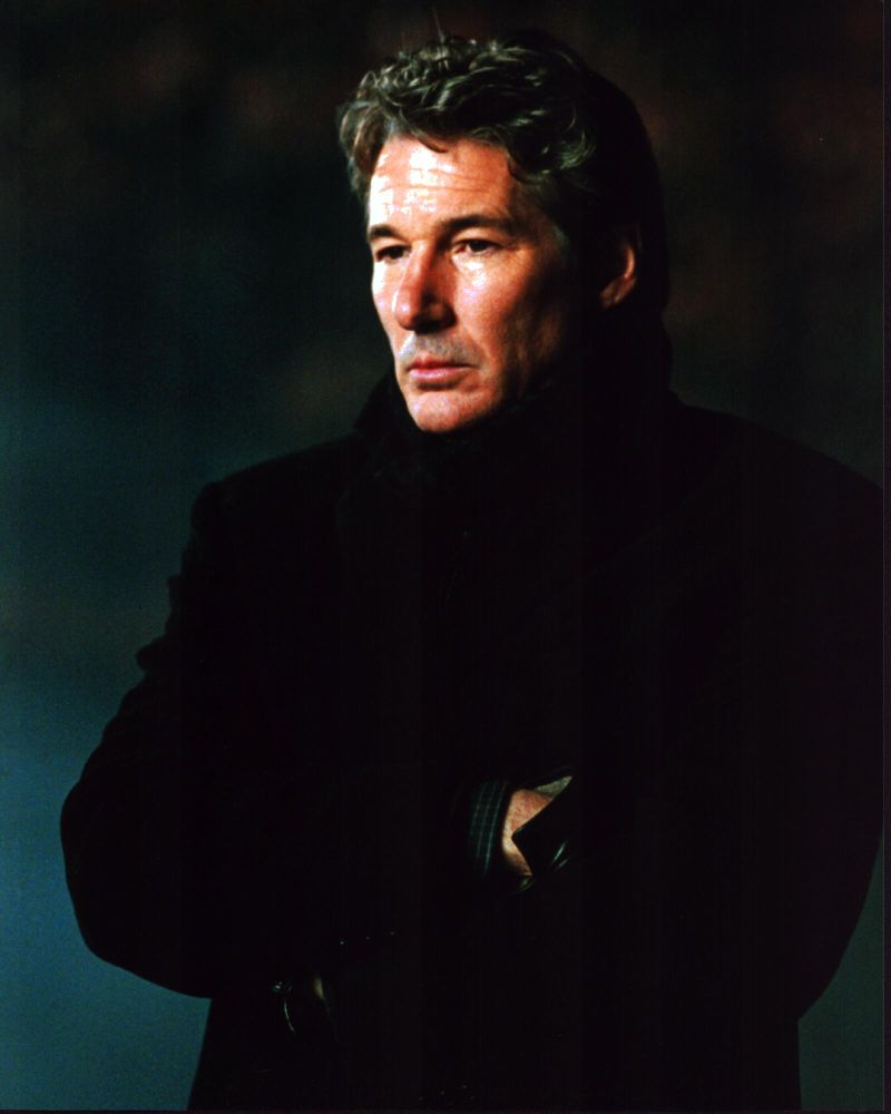 Richard Gere photo print with arms crossed in coat and gloves, available at Posterazzi.
