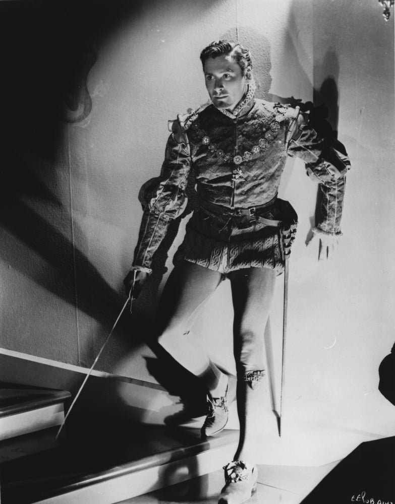 Classic Errol Flynn photo print showcasing Hollywood's golden age.