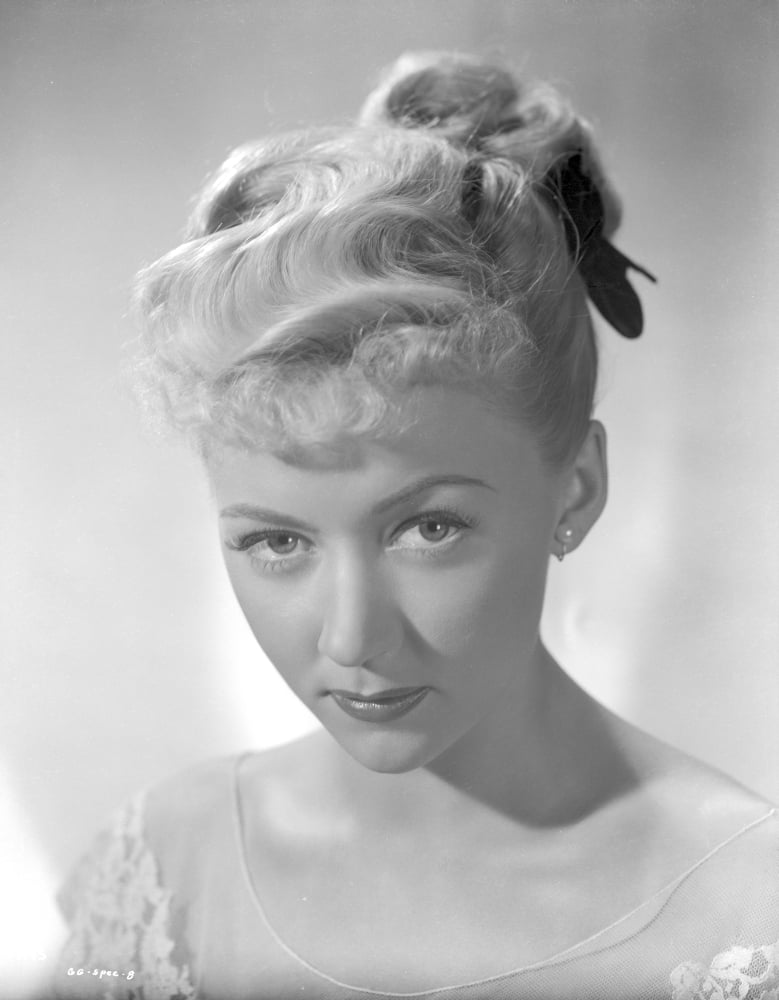 Vintage photo print of Gloria Grahame in a white gown with red lipstick