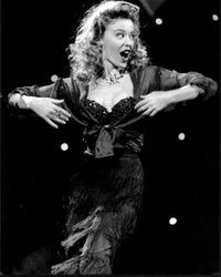 Kylie Minogue black and white photo print in tassle dress on stage