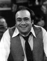Danny DeVito smiling photo print, available in various sizes.
