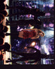 Kylie Minogue singing on stage in a red silk dress photo print.