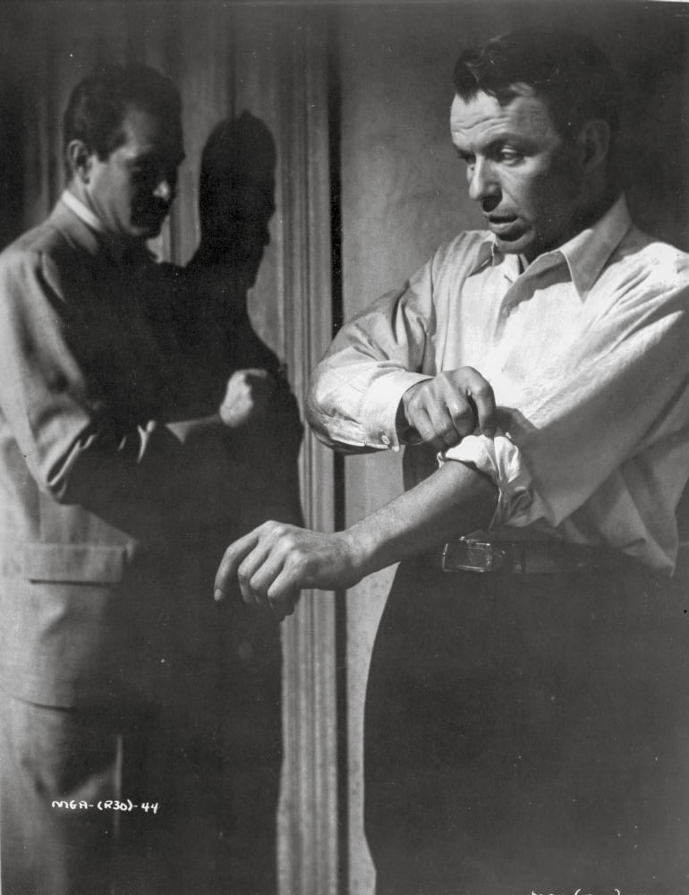 Man with The Golden Arm Photo Print featuring a character folding his sleeves.