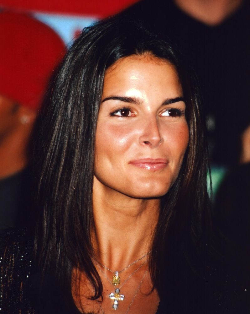 Angie Harmon close-up photo print with silver cross necklace
