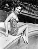 Debbie Reynolds Poolside 1954 Photo Print showcasing vintage Hollywood charm.