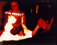 Juliette Lewis and Woody Harrelson sitting by a fire in Natural Born Killers photo print.
