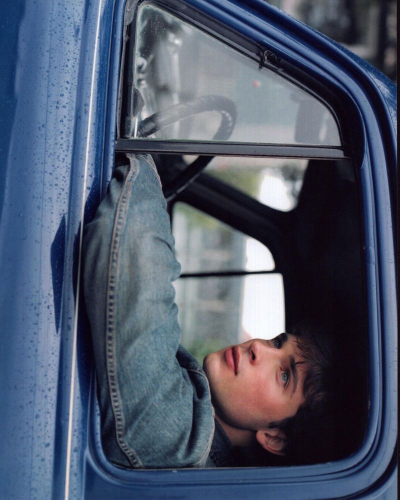 Tom Welling photo print in blue truck, available in multiple sizes.