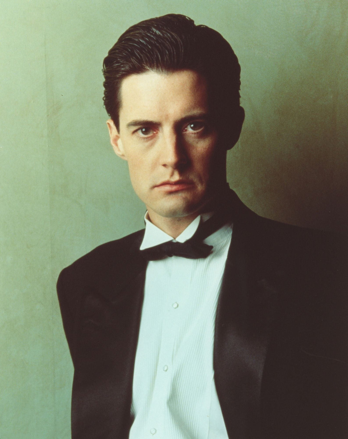 Stylish portrait photo print of Kyle MacLachlan in a suit.