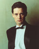 Stylish portrait photo print of Kyle MacLachlan in a suit.