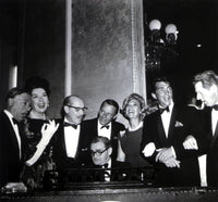 Frank Sinatra posing with a group of people photo print