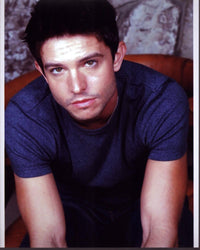 Jason Behr leaning forward photo print in a gray shirt