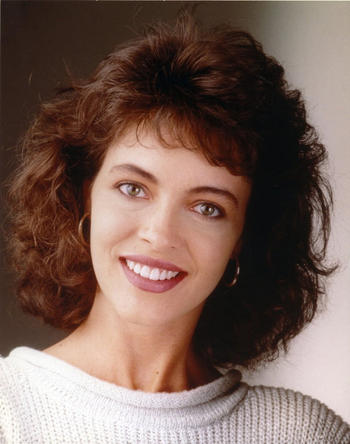 Close-up portrait of Mary Keller wearing a white sweater photo print