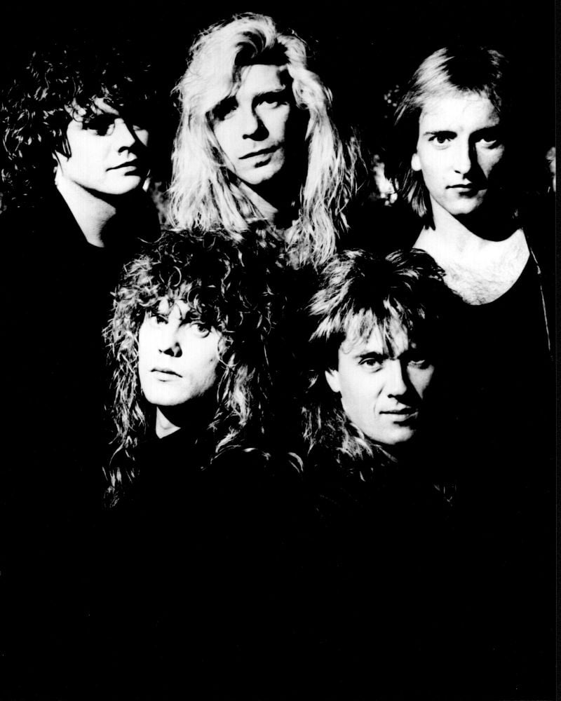 Def Leppard black and white photo print showcasing the iconic rock band.