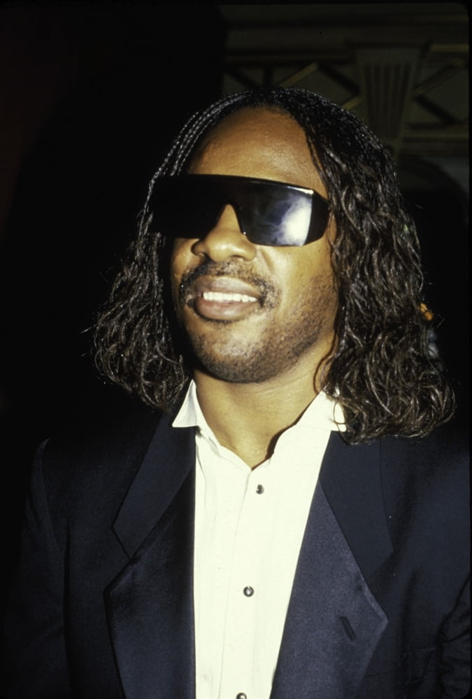 Stevie Wonder smiling photo print, vibrant music art, available in multiple sizes.