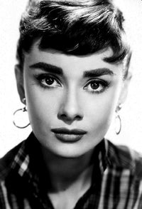 Audrey Hepburn wearing hoop earrings photo print, showcasing classic elegance.