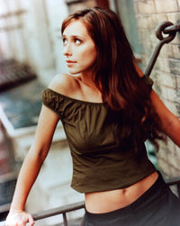 Jennifer Love Hewitt photo print looking up while on railing.