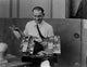Lon Chaney film set photo print showcasing disguises and classic Hollywood charm.
