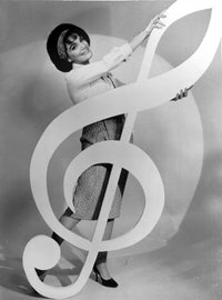 Connie Francis holding a Gclef note in elegant dress photo print