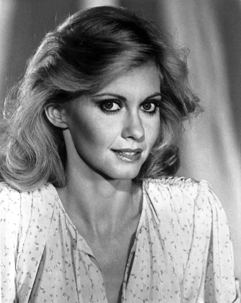 Portrait photo print of Olivia Newton John, capturing her beauty and elegance.