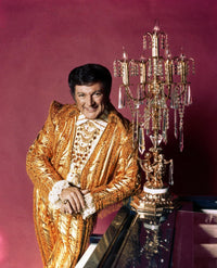 Liberace iconic photo print showcasing flamboyant style and charisma.
