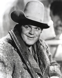 Black and white Bonanza cowboy portrait photo print featuring a cowboy in outfit with rifle.