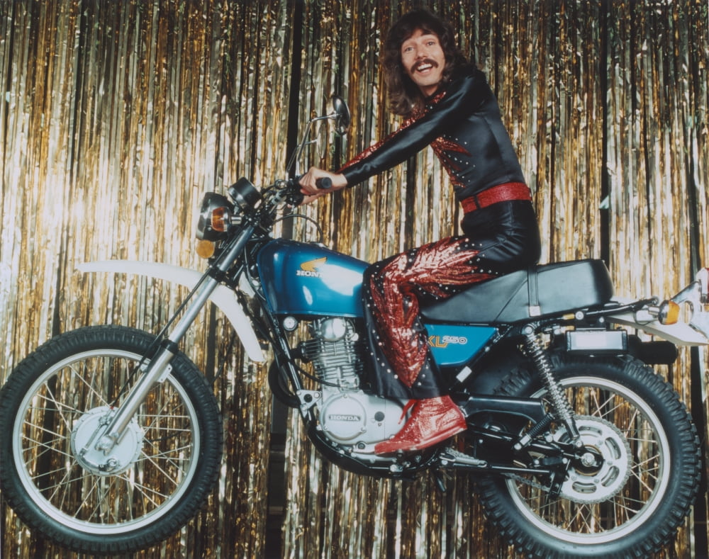 Doug Henning Riding a Motorbike Photo Print - 10x8