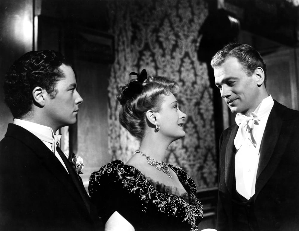The Magnificent Ambersons movie poster print featuring Tim Holt, Dolores Costello, and Joseph Cotten from the 1942 classic.