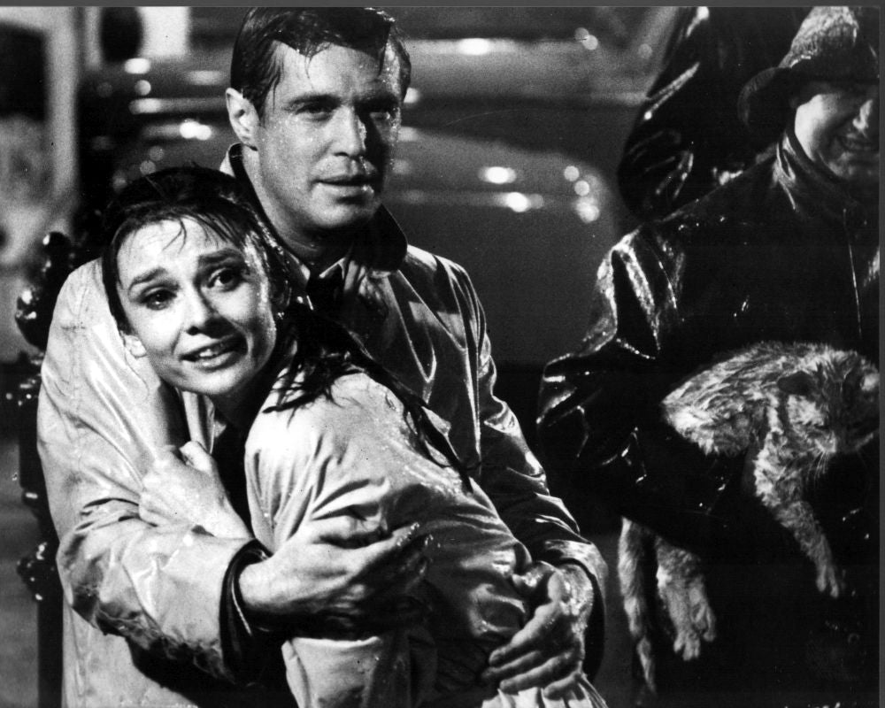 Audrey Hepburn and George Peppard in the rain scene from Breakfast at Tiffany's photo print