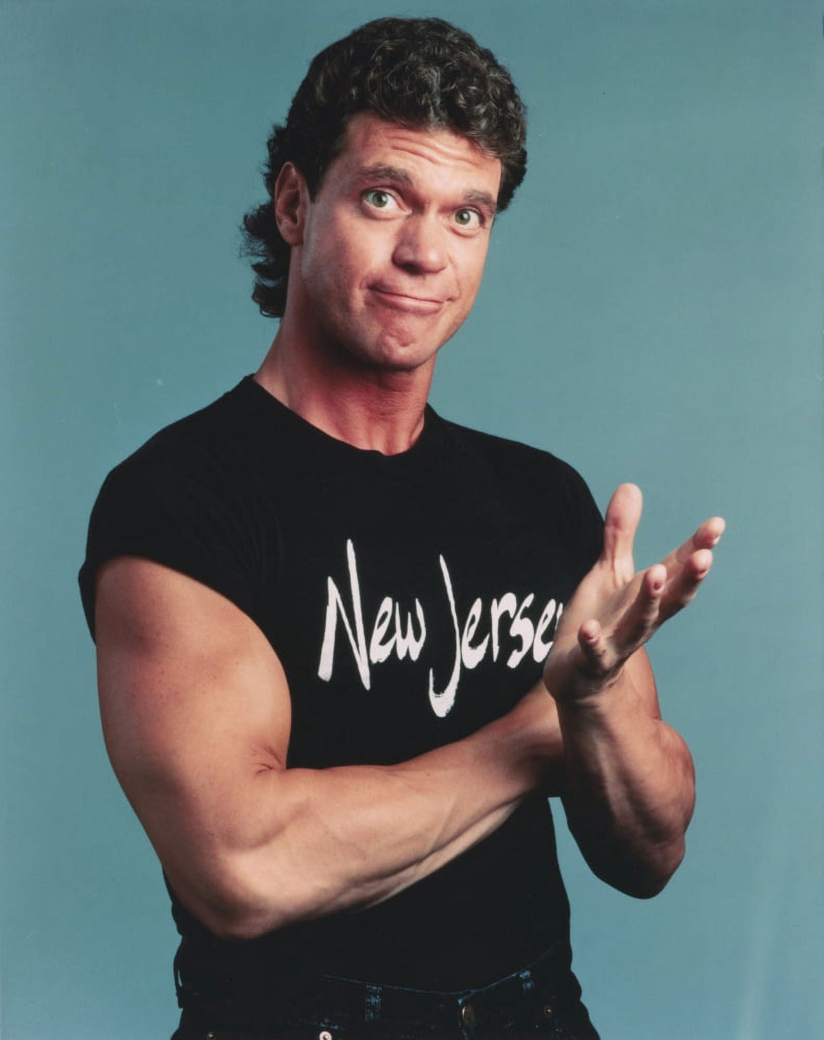 Close-up portrait photo print of Joe Piscopo wearing a sleeveless shirt.