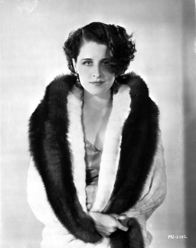 Norma Shearer posed elegantly in a feather coat photo print