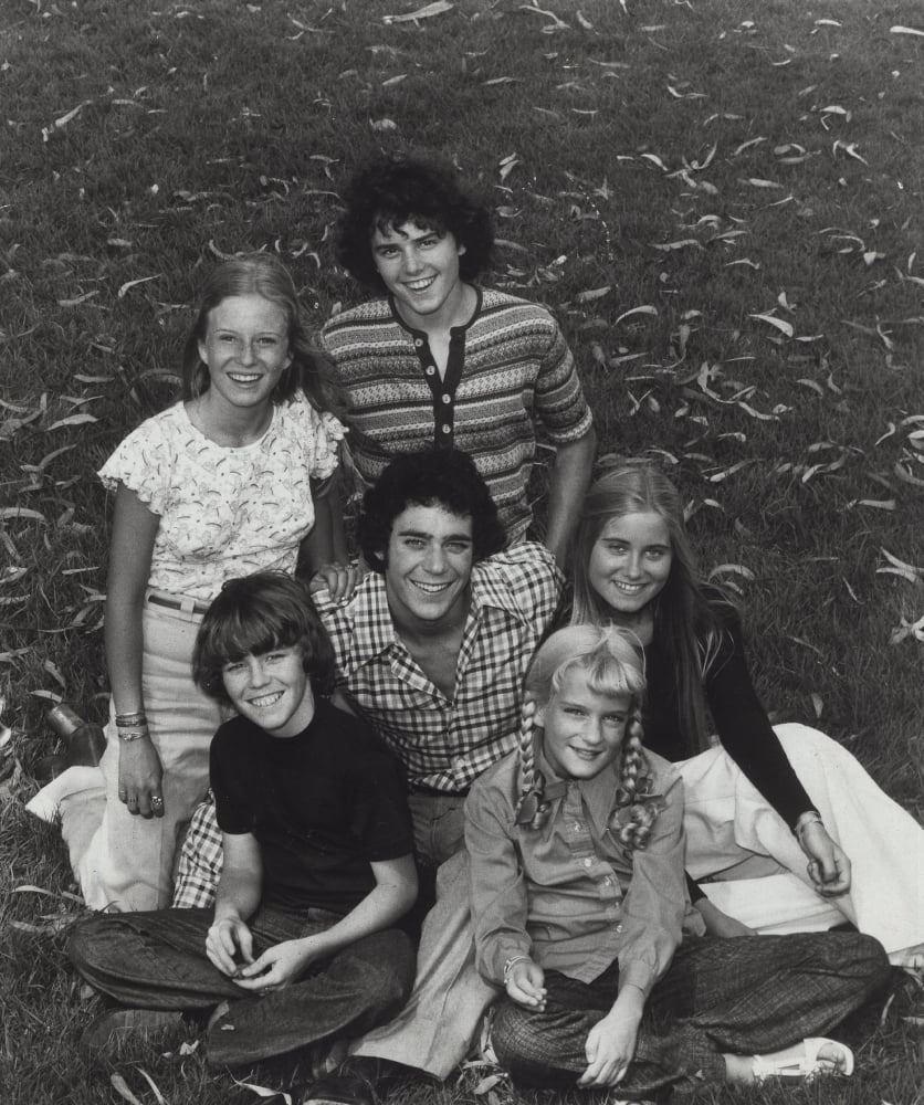 The Brady Bunch cast photo print featuring iconic television characters.