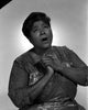 Mahalia Jackson singing in a floral blouse with a white background photo print