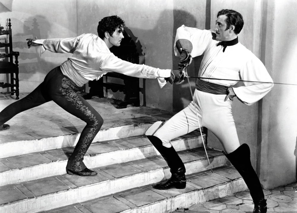 The Mark of Zorro movie poster print featuring Tyrone Power and Basil Rathbone.