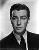 Robert Taylor posed with a horse photo print, classic film art.