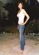 Catherine Bell posed in a white dress photo print
