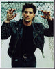 Ken Wahl photo print in leather jacket leaning on fence