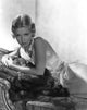 Joan Bennett reclining in a 1933 portrait photo print by George Hurrell.