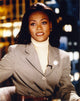 Elegant photo print of Robin Givens posed in a white turtleneck.