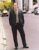 Portrait photo print of Christopher Meloni standing in a coat